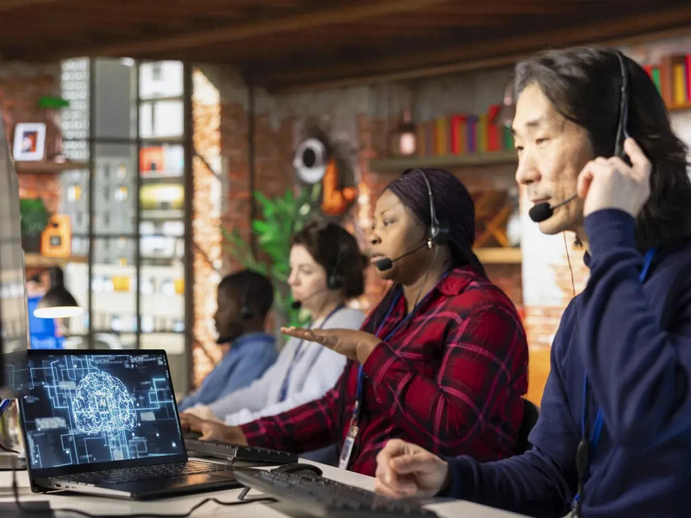 Support team handling customer queries at their desks